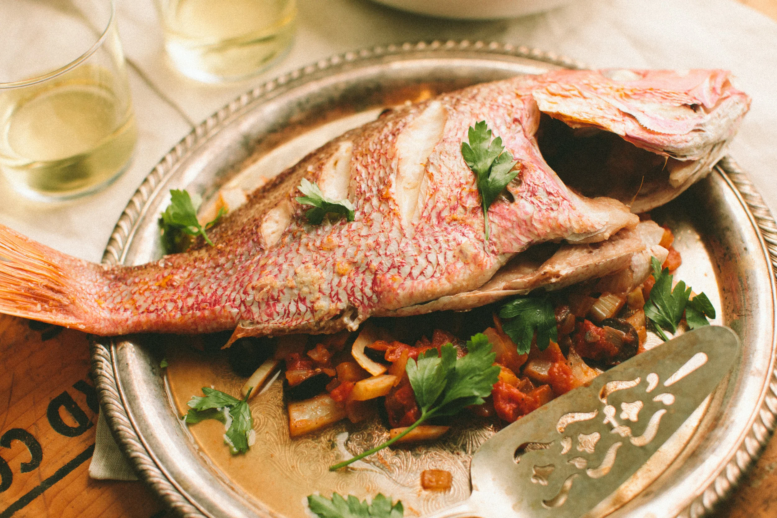 Roasted Whole Red Snapper with Tomato, Fennel, and Olives — A